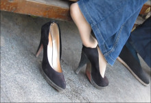 feet dangling with jeans and playing shoes